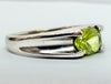 18ct White Gold ring with green stone size L