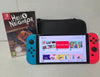 Nintendo Switch OLED Neon Red/Blue & 1 Game