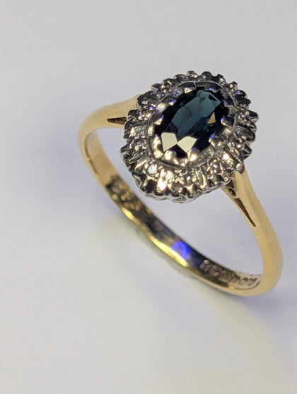 18ct gold diamond & black stone ring