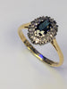 18ct gold diamond & black stone ring