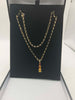 hallmarked 9k gold  16" necklace with 3 amber pieces 3.8 grams . box included