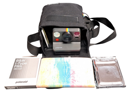 Polaroid Now Camera - with accessories and carry case.