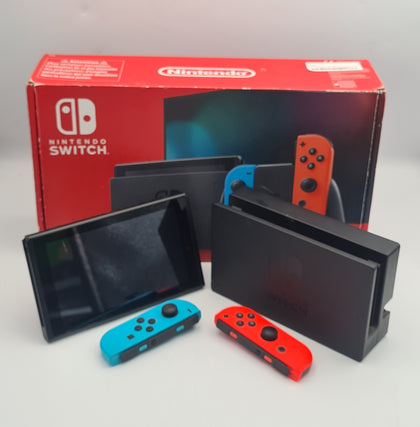 Nintendo Switch 32GB handheld console with red/Blue joycon, charger and cradle BOXED