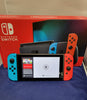 Nintendo Switch Console, 32GB + Neon Red/Blue Joy-Con