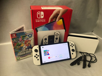 Nintendo Switch OLED - White and Super Mario Bros. Wonder.