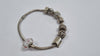 PANDORA BRACELET + 7 CHARMS LEYLAND