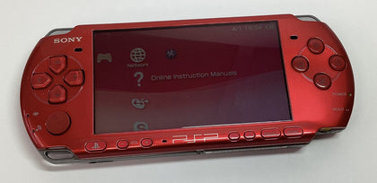 Sony PSP handheld console with charger and case