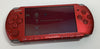 Sony PSP handheld console with charger and case