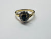 18CT GOLD RING WITH DIAMOND AND SAPPHIRE SIZE O