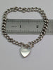 SILVER CHARM BRACELET WITH HEART LOCK