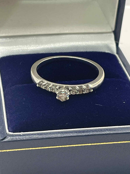 9ct White Gold Ring with clear stones  - Q