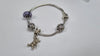 Silver Bracelet with 4 charms
