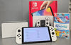Switch Console, 64GB OLED + White Joy-Con, Boxed + 1 Game