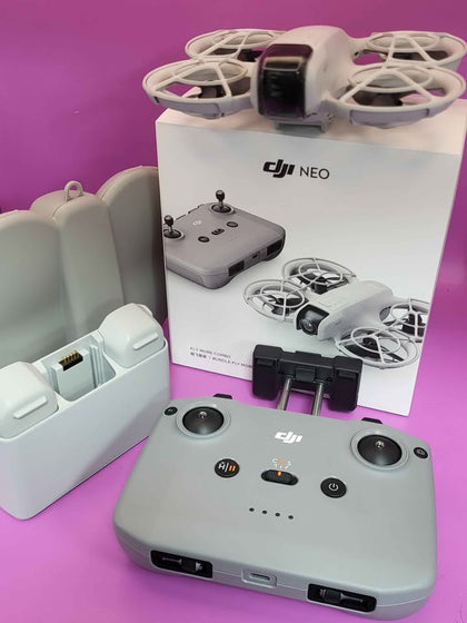 DJi Neo Flymore Bundle Camera Drone / 3 batteries / Clam case  / Controller