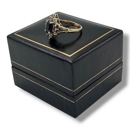 9ct 2.53gram  yellow gold ring with 1 black and small stones -1 stone missing