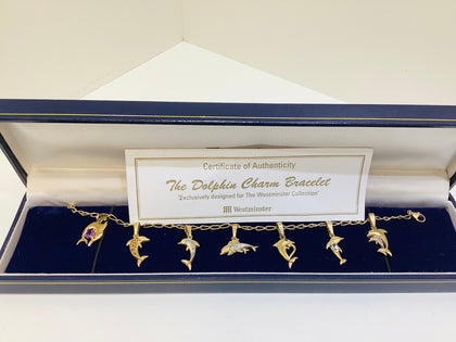 9ct Dolphin bracelet set with diamonds.