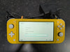 Switch Lite Yellow + Official Charger