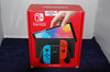 Nintendo Switch OLED Model w/Neon Red & Neon Blue Joy-Con