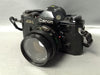 Canon AE-1 Black 35mm SLR Film Camera with Canon Prime Lens