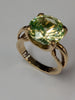 9ct gold ring with large lime green stone size M