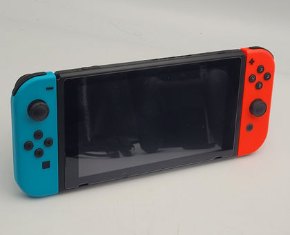 Nintendo Switch 32GB console with red/blue joycons, Dock, charger and cradle UNBOXED
