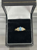 Ring with a light blue stone 2.7g 9ct GOLD with box in excellent condition