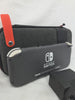 Nintendo Switch Lite Console, 32GB Grey with a carry case and charger