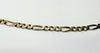 9ct gold figaro chain 21.5"