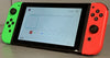 Nintendo Switch MOD.HAC-001(-01) V2 Neon Green/Neon Red Console Bundle ( + Lego Worlds ) ** Unboxed **