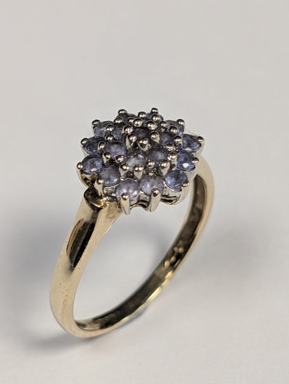 9ct gold ring with lilac stones
