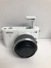 Nikon 1 J1 - Digital Camera - Mirrorless - 10.1 MP - 3x Optical Zoom 1 Nikkor VR 10-30Mm Lens - White