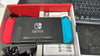 Nintendo Switch (Neon Red/Blue)