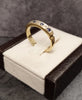 9ct Yellow Gold Blue & Clear Stones Half Eternity Ring Size -Q