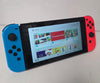 Nintendo Switch Console - Neon Red/Blue & 1 Game