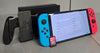 Switch Console, 64GB OLED + Mixed Joy-Con + Pokemon Violet