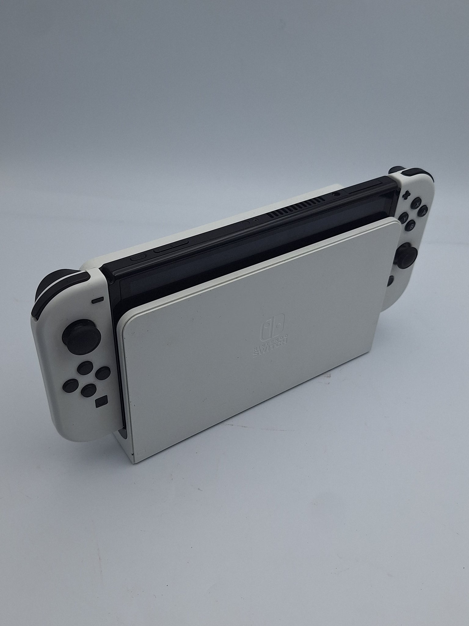 Nintendo Switch OLED 64GB black/white gaming console with dock