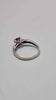 9ct White Gold Ring With Red Triangle Stone - Size R - 2.47 Grams