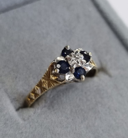9ct gold flower ring blue stone Size N