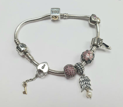 PANDORA BRACELET WITH 7 CHARMS
