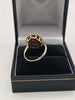 9k Hallmarked gold ring , red stone flower - 3.7 grams size o