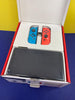 Nintendo Switch OLED - Neon Blue/Neon Red NEW