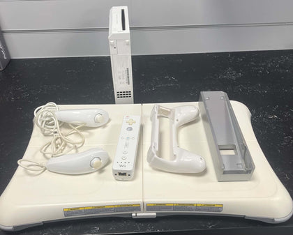 WII bundle- Console, fit board and 1 nun chucks.