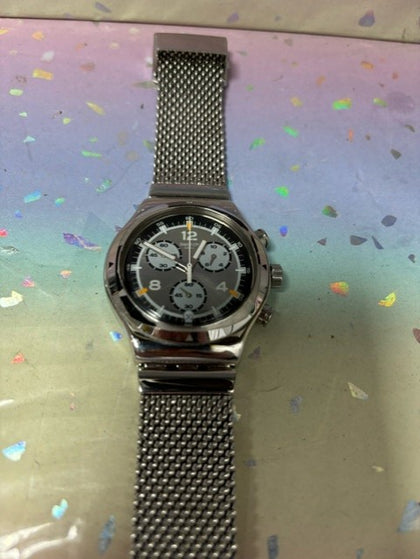 swatch silver watch.