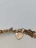 375 9CT HALLMARKED, YELLOW GOLD, 4 BAR GATE LINK BRACELET WITH HEART PADLOCK, 7", 4.45G
