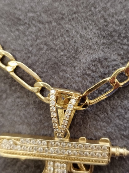 14k Uzi Pendant and 25
