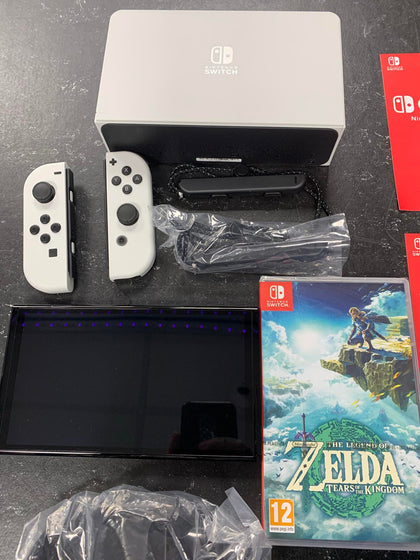 Nintendo Switch OLED Model - White with zelda games and 24 months membership.