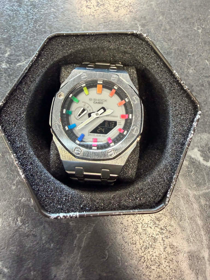 Casio GA-2100 with Hand painted hour markers in Rainbow gradient.