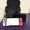 Nintendo Switch OLED - Red and Pastille pink Joy-Con