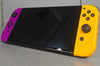 Switch Console, 64GB OLED + Purple & Orange Joy-Con, Unboxed