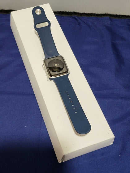 Apple Watch SE (GPS + Cellular, 44 mm) - Silver Aluminium Case with Abyss Blue Sports Band